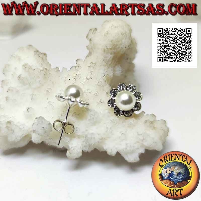 Silver earrings from lobe to flower with a central pearl surrounded by white zircons