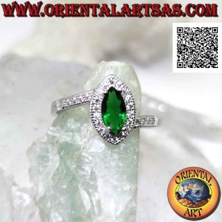 Silver ring with synthetic shuttle emerald set surrounded by white zircons and on the sides