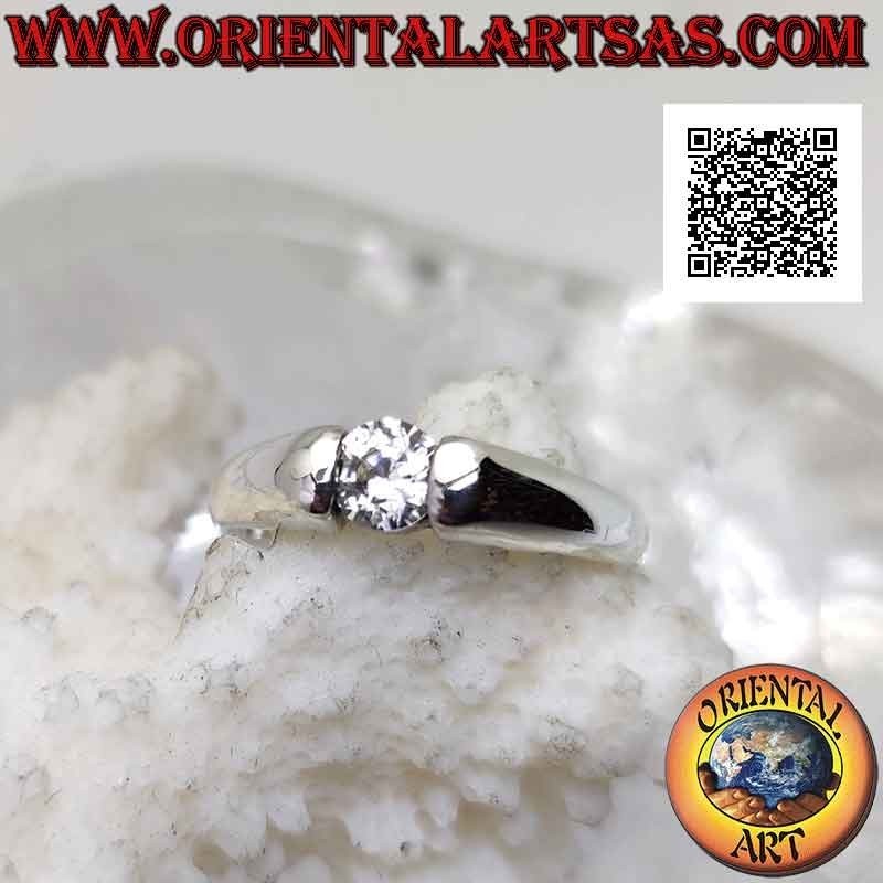 Smooth solitaire silver ring with round white zircon set in the junction of the band