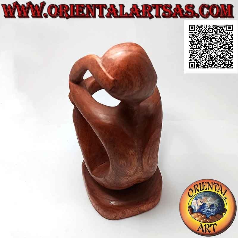 Portabotellas escultura de un pensador sentado en reflejo en madera de Suar