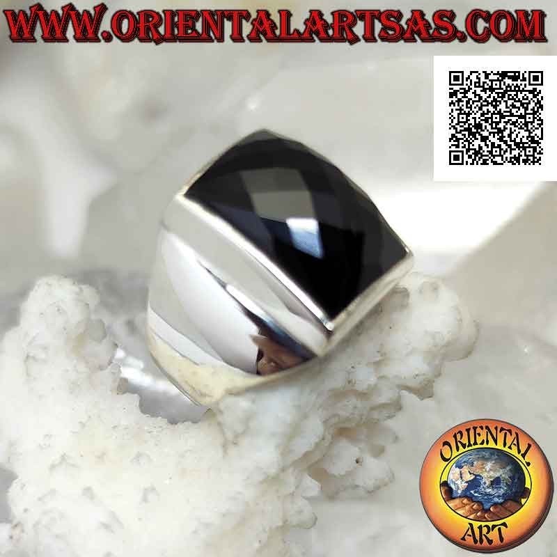 Silver ring with faceted rounded rectangular onyx on smooth frame with raised dial