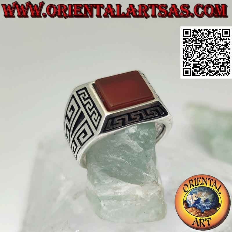 Silver ring with rectangular carnelian, surrounded by Greek in bas-relief