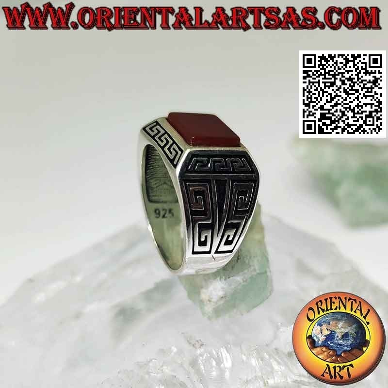 Silver ring with rectangular carnelian, surrounded by Greek in bas-relief