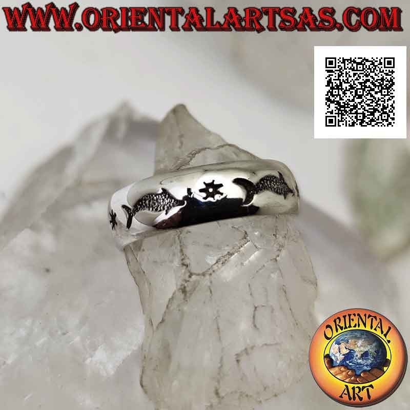 Silver band ring worked with a series of dolphins in bas-relief