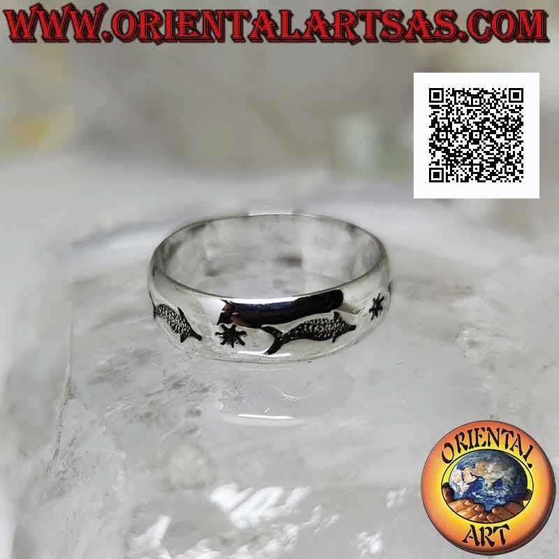 Silver band ring worked with a series of dolphins in bas-relief