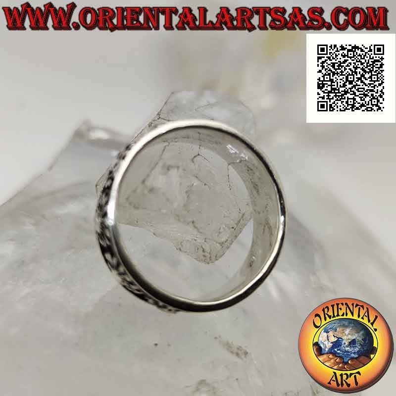 Silver band ring worked with a series of bas-relief daisies