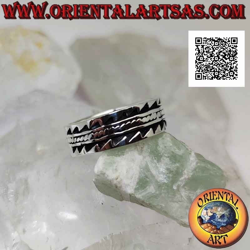 Silver ring with worked band with toothed bas-relief decoration