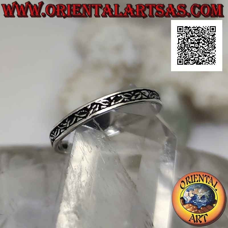 Silver ring with thin band worked with micro floral bas-relief decoration