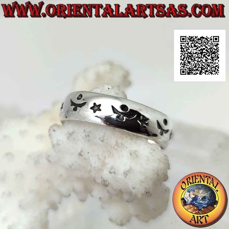 Bague en argent travaillée d'étoiles et décor astral alterné