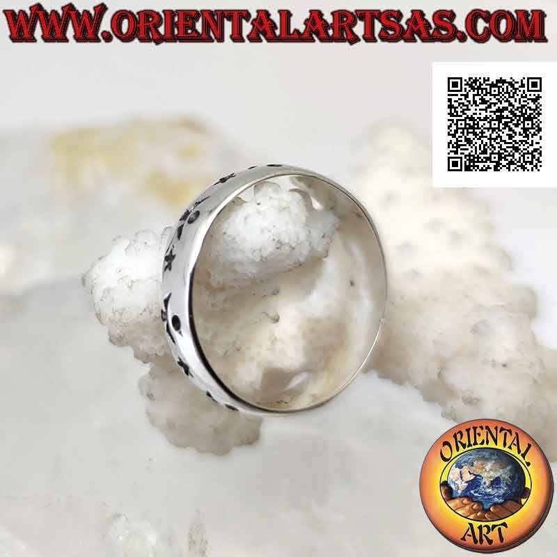Bague en argent travaillée d'étoiles et décor astral alterné