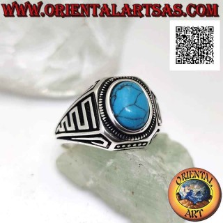 Anello in argento con turchese ovale cabochon e onde in bassorilievo sui lati