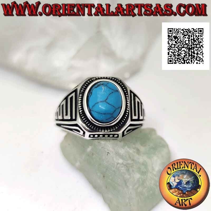 Anello in argento con turchese ovale cabochon e onde in bassorilievo sui lati