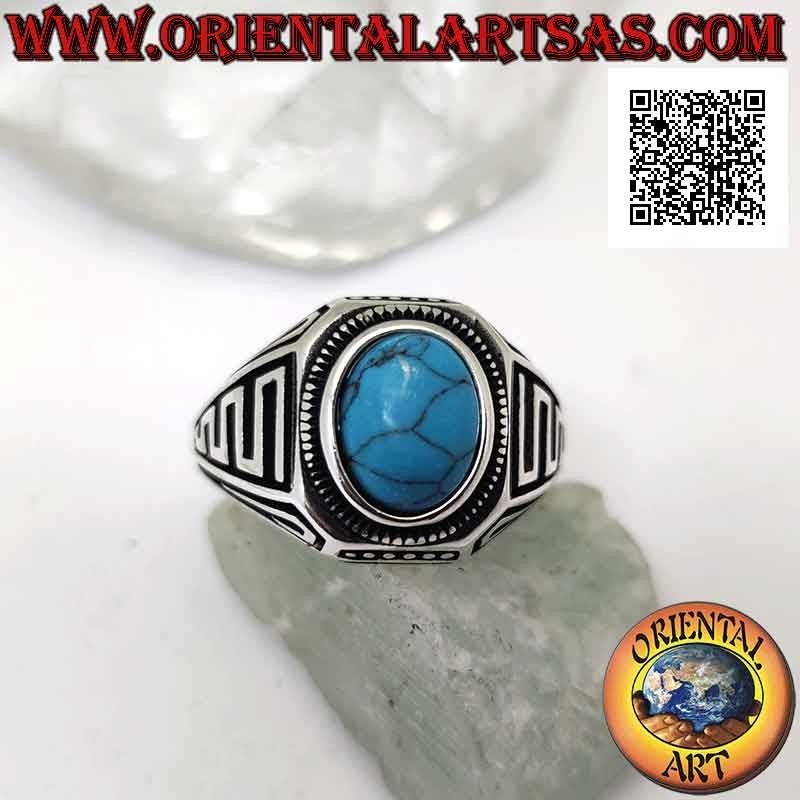 Silver ring with oval cabochon turquoise and waves in bas-relief on the sides