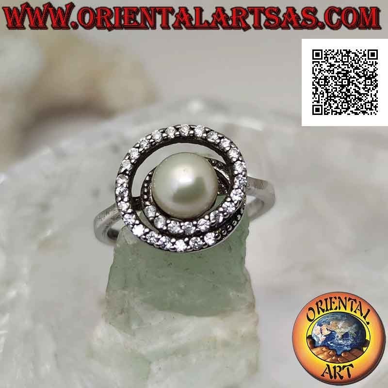 Silver ring with freshwater pearl in the center of a zircon spiral