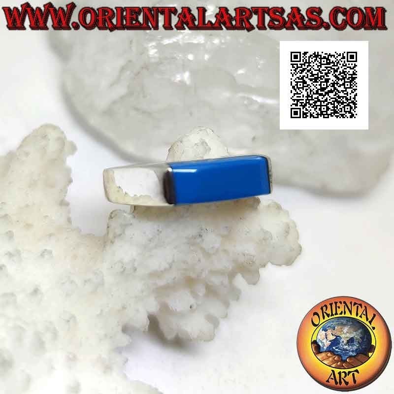 Anillo de plata lisa con turquesa rectangular alargada que sobresale por dos lados