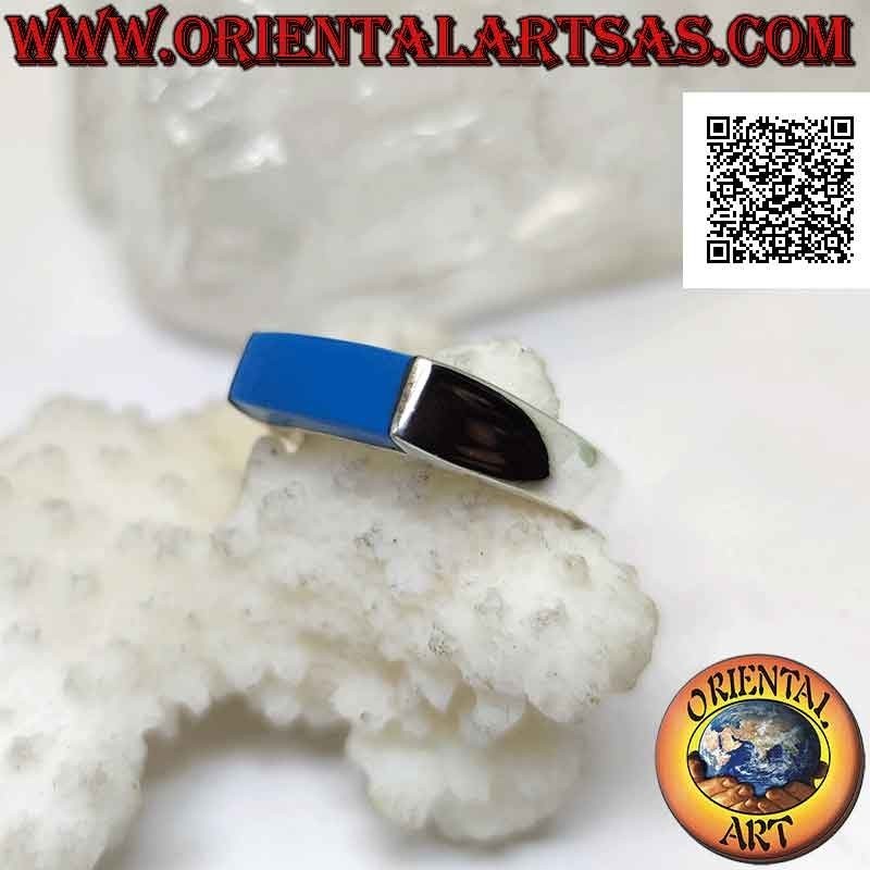 Anillo de plata lisa con turquesa rectangular alargada que sobresale por dos lados