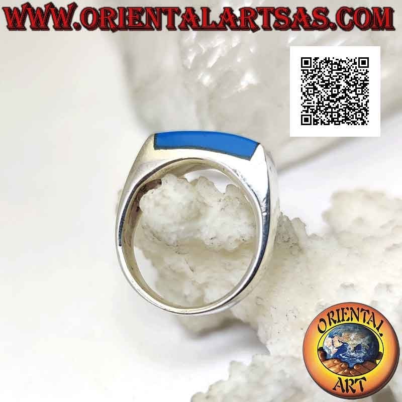 Anillo de plata lisa con turquesa rectangular alargada que sobresale por dos lados