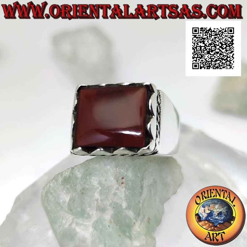 Silver ring with raised rectangular framed carnelian and side cord