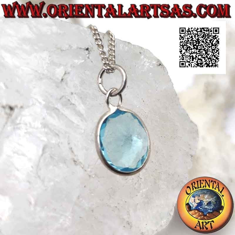 Colgante de plata con topacio azul natural ovalado en engaste sencillo con borde liso