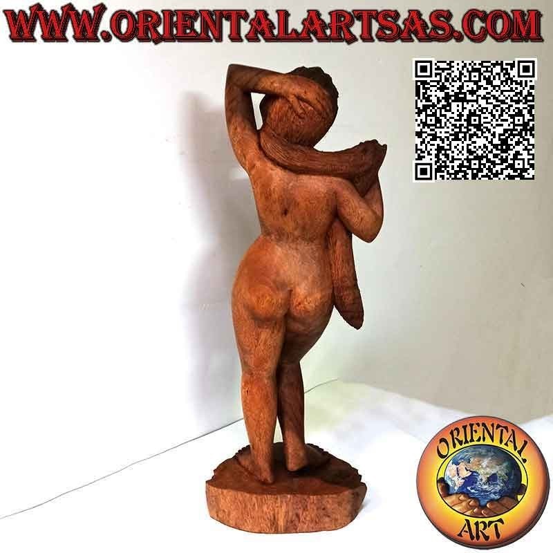 Estatua escultórica de una mujer oriental desnuda posando realizada en un solo bloque de madera de suar (60 cm)