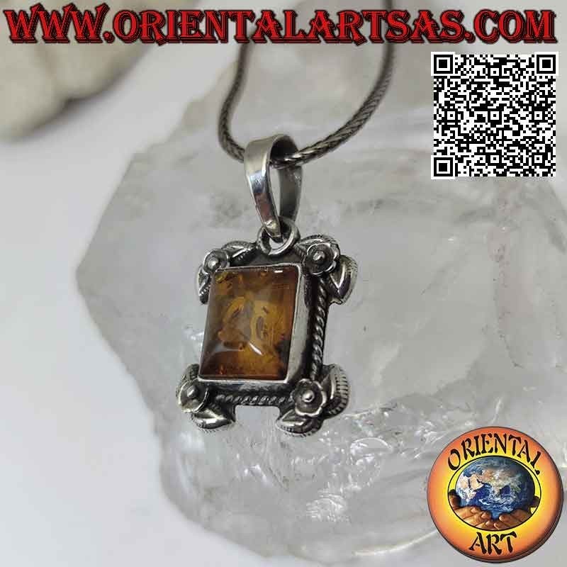 Silver pendant with rectangular Baltic amber surrounded by intertwining and roses on the four corners