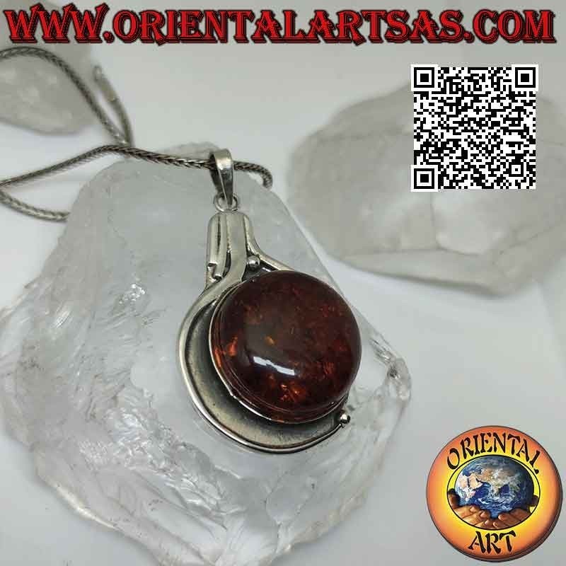 Silver pendant with large round Baltic amber on a smooth bas-relief setting