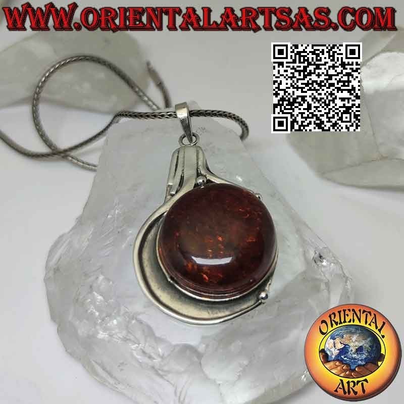 Silver pendant with large round Baltic amber on a smooth bas-relief setting