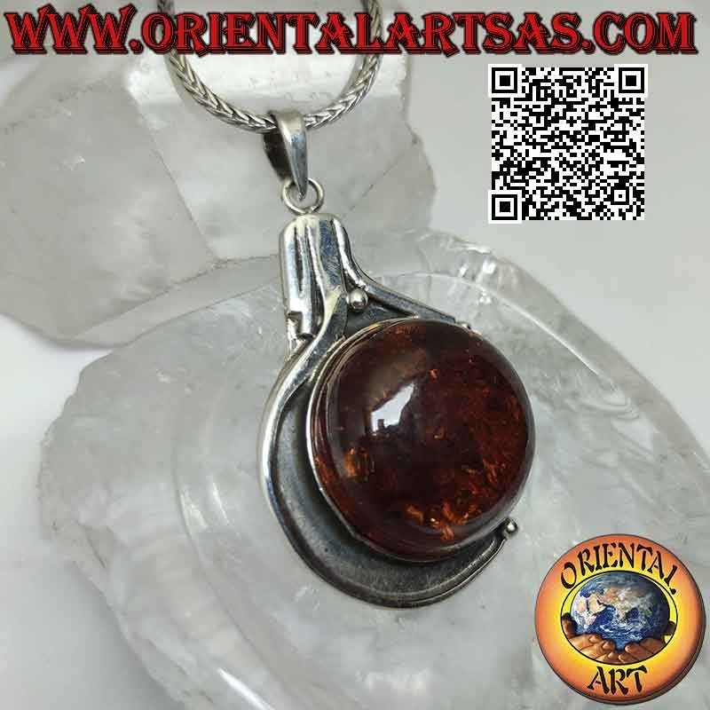 Silver pendant with large round Baltic amber on a smooth bas-relief setting