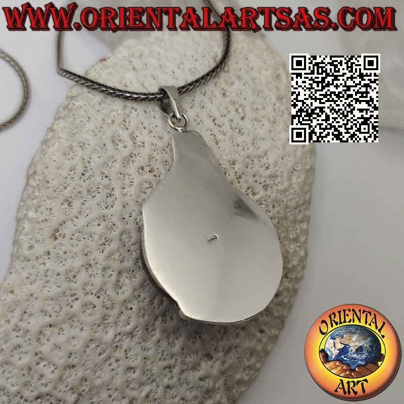 Pendentif en argent avec gros ambre rond de la Baltique sur une monture lisse en bas-relief