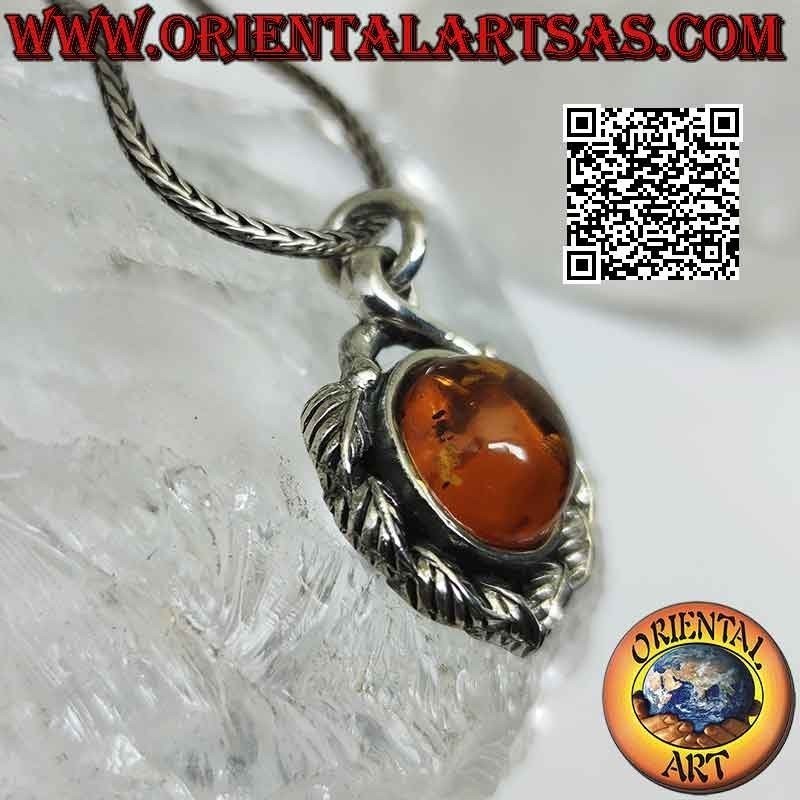 Silver pendant with round cabochon Baltic amber surrounded by leaves