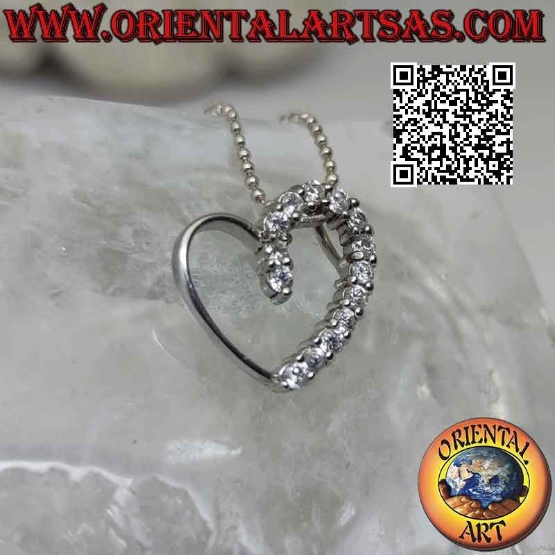 Pendentif en argent, contour d'un coeur linéaire à moitié piqué de zircons