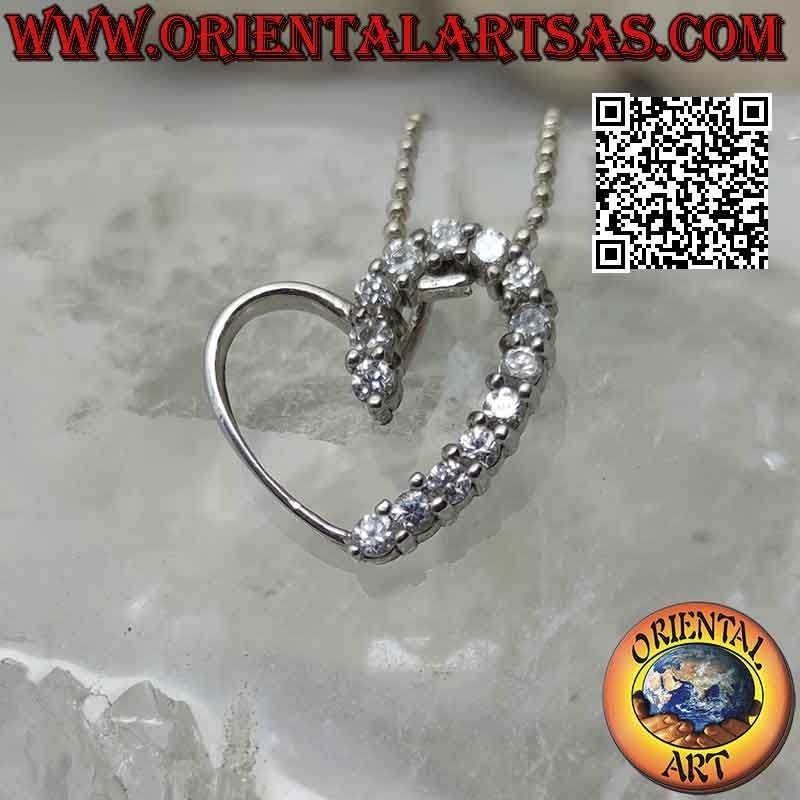 Silver pendant, contour of a linear heart half studded with zircons