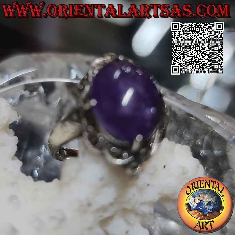 Silver ring with cabochon oval amethyst set in a marcasite-studded setting
