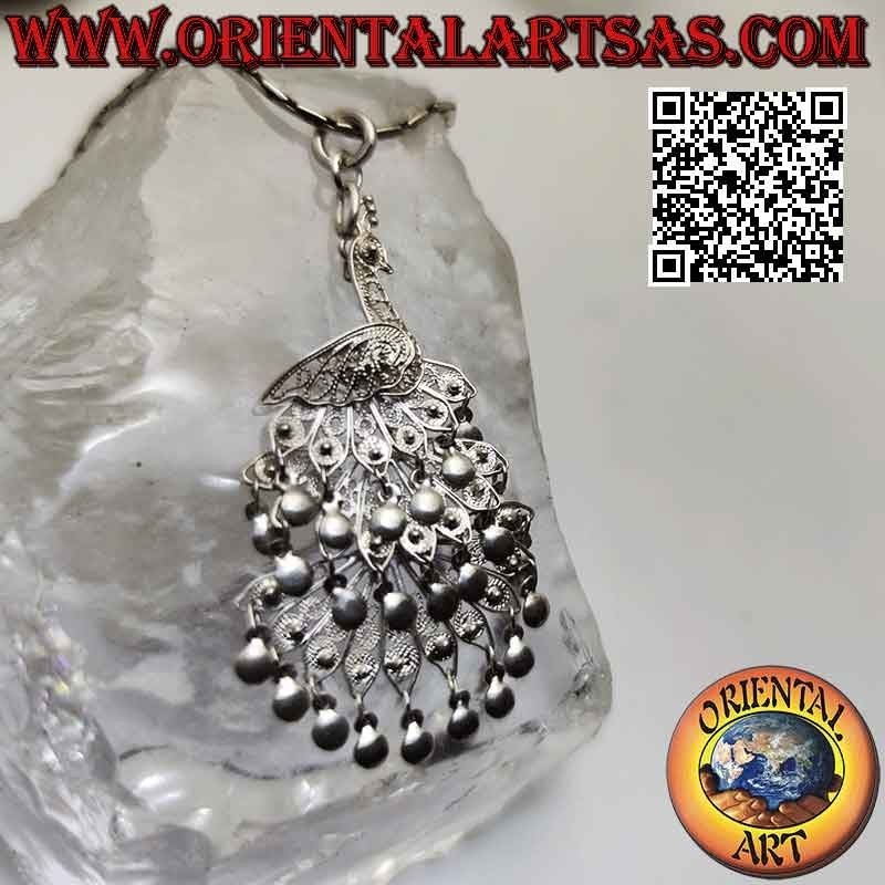 Silver pendant, hand made filigree in the shape of a large peacock