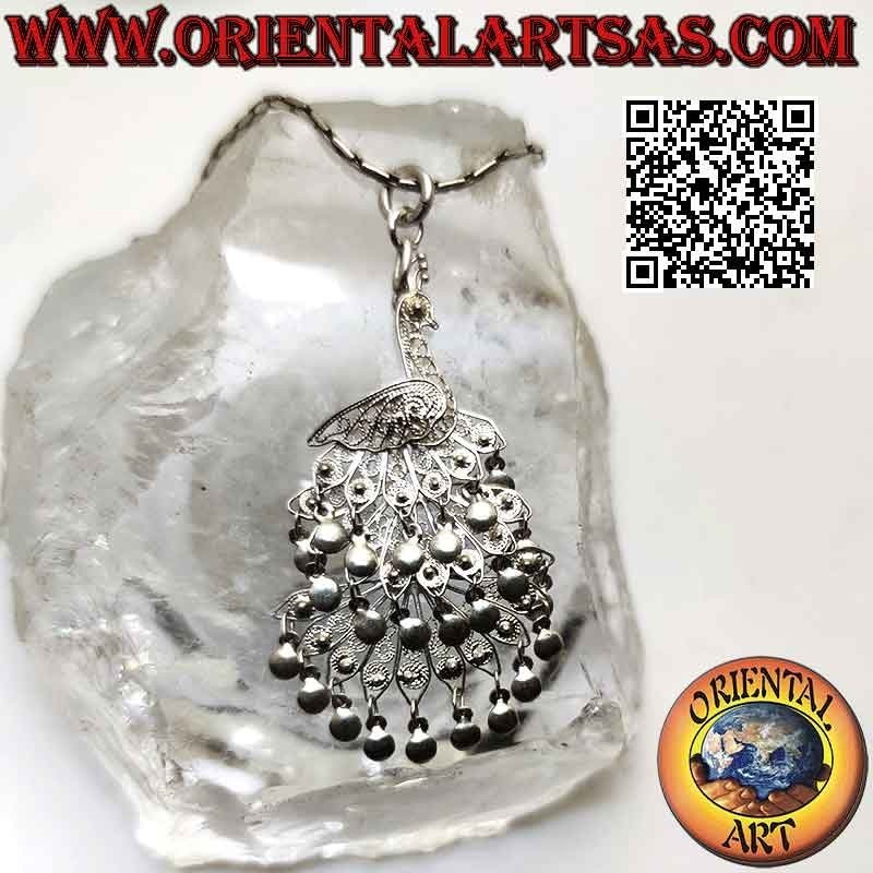 Silver pendant, hand made filigree in the shape of a large peacock