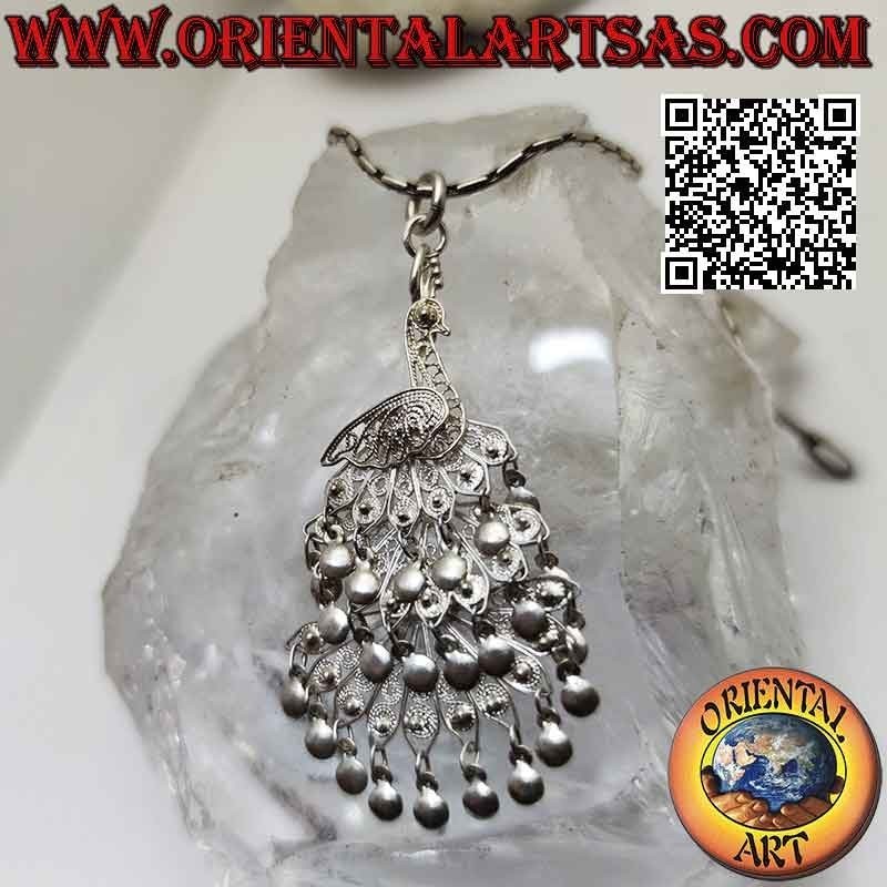 Silver pendant, hand made filigree in the shape of a large peacock