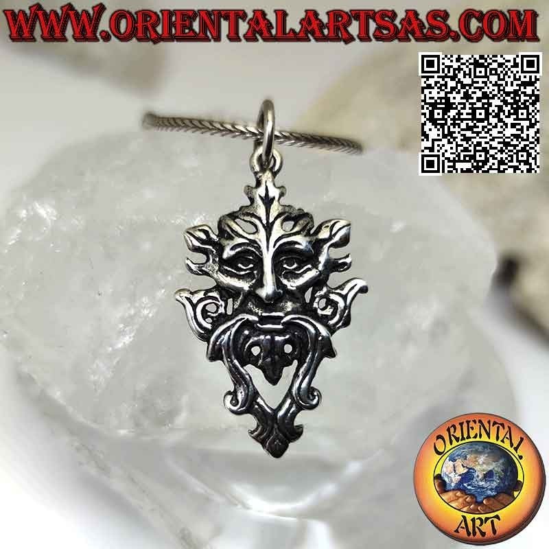 Silver pendant in the shape of "the Green Man" (Celtic figure symbol of life force)