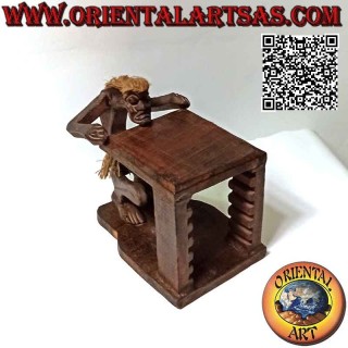 CD holder in primitive style with sculpture of an aboriginal in teak wood (26 cm)