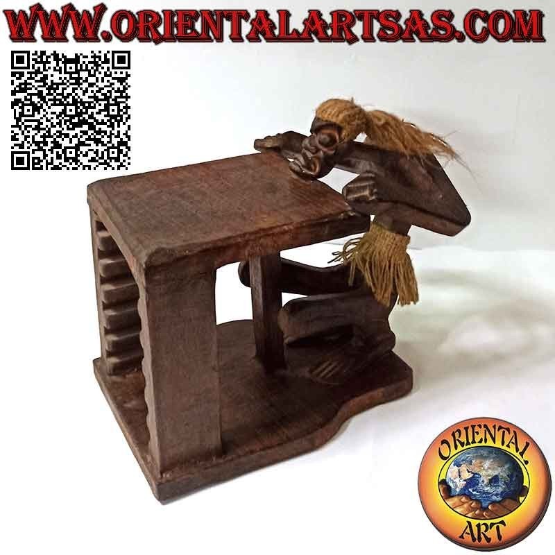 Porte-CD de style primitif avec sculpture d'un aborigène en bois de teck (26 cm)