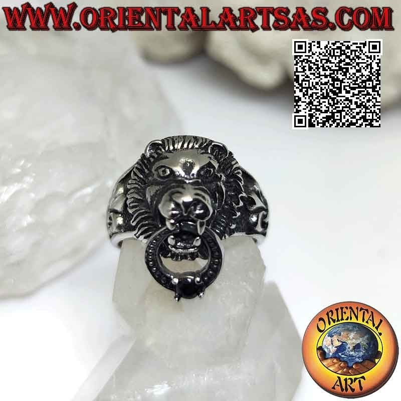 Surgical steel ring (316L), lion grabbing a circle with set garnet and lily on the sides