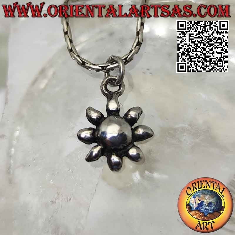 Smooth silver pendant in the shape of a sun or small flower