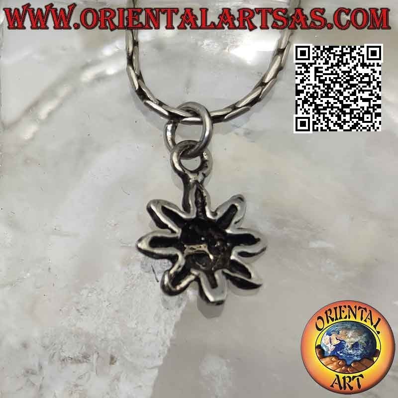 Smooth silver pendant in the shape of a sun or small flower