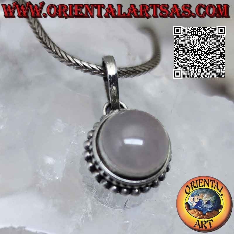 Silver pendant with round cabochon pink quartz surrounded by balls