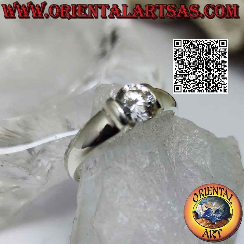 Smooth solitaire silver ring with round white protruding zircon set in the junction of the band