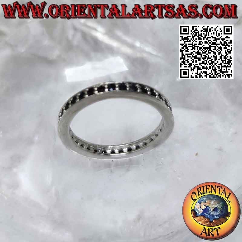 Silver ring with thin band studded with black zircons (2 mm)