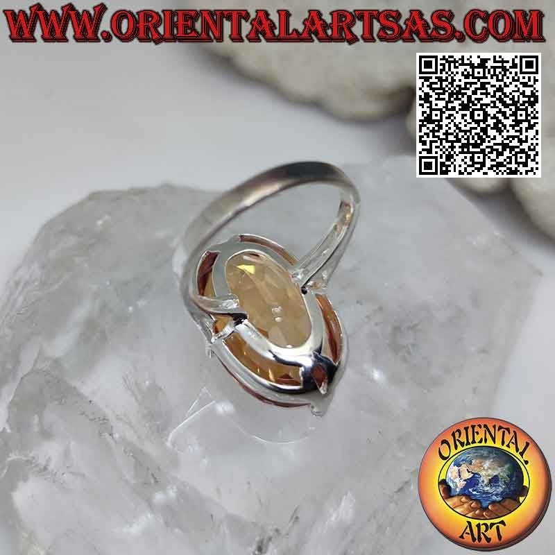 Silver ring with large champagne zircon set oval on a simple setting