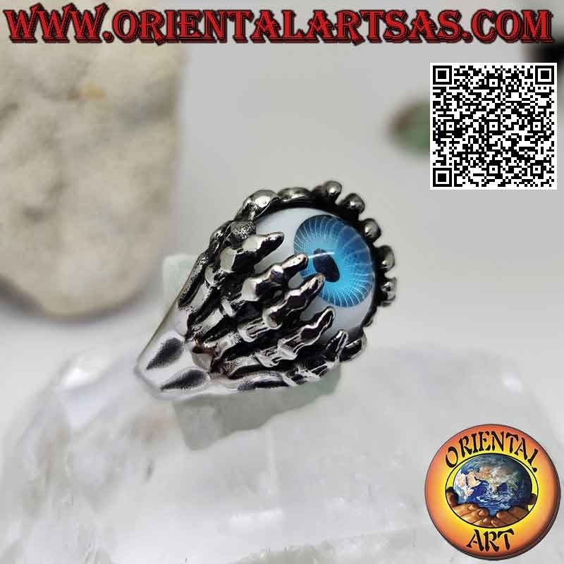 Bague en acier chirurgical (316L), oeil bleu saisi par des mains squelettiques