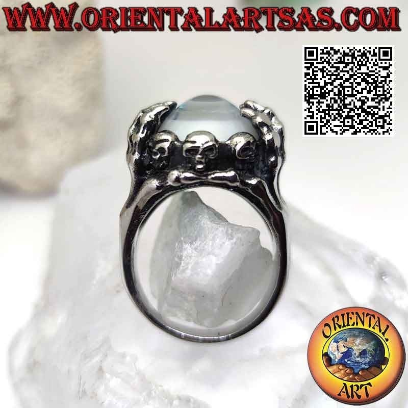 Bague en acier chirurgical (316L), oeil bleu saisi par des mains squelettiques