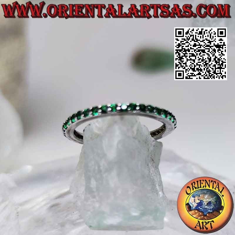 Silver ring with "Eternity" band studded with green zircons (2 mm)