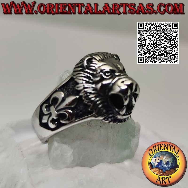 Surgical steel ring (316L), lion head and lily in bas-relief on the sides